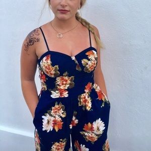 Floral jump suit with floppy bottoms, cup top- super fun!